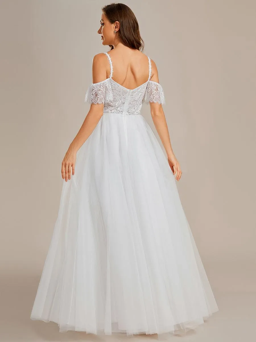 Robe de mariée romantique en dentelle transparente avec corsage et bretelles spaghetti à manches courtes en tulle